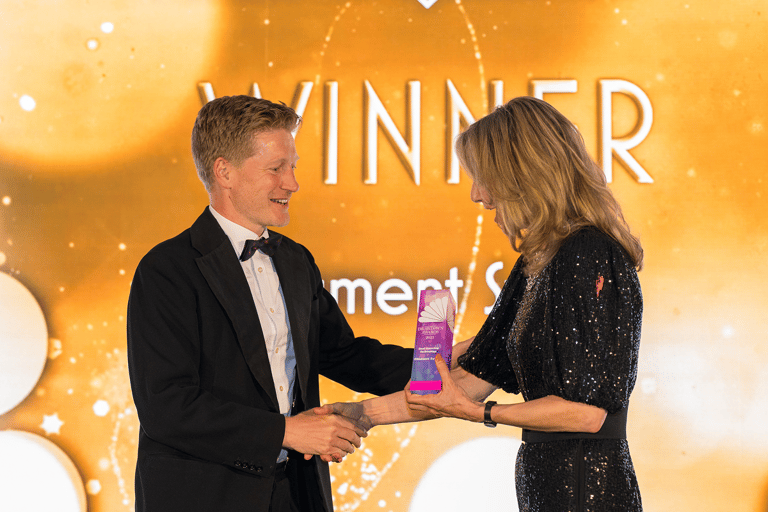 Phil accepting award